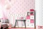 Mobile Preview: Raschtextil Punktetapete rosa an der Wand