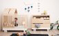 Preview: Kutikai Babybett Umbauset Häuschenform mit spielendem Kind