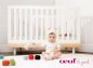 Preview: Oeuf Babybett Classic Birke mit spielendem Kind